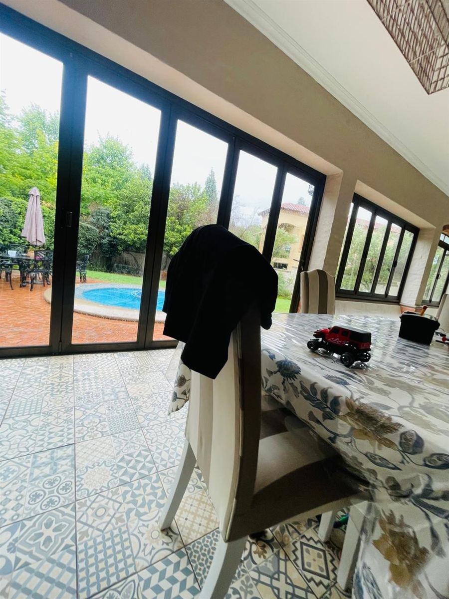 Glazed patio doors adjoining a residential living and dining area